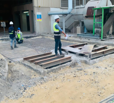 Concrete Road Construction with Manholes and Asphalt Overlay